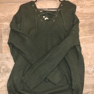 Sweater with cross ties